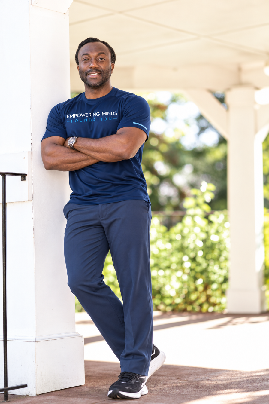 Dr. Adam Stevens in an Empowering Minds Foundation shirt
